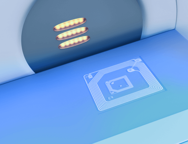 An electronics engineer is soldering an integrated circuit to a printed circuit board.