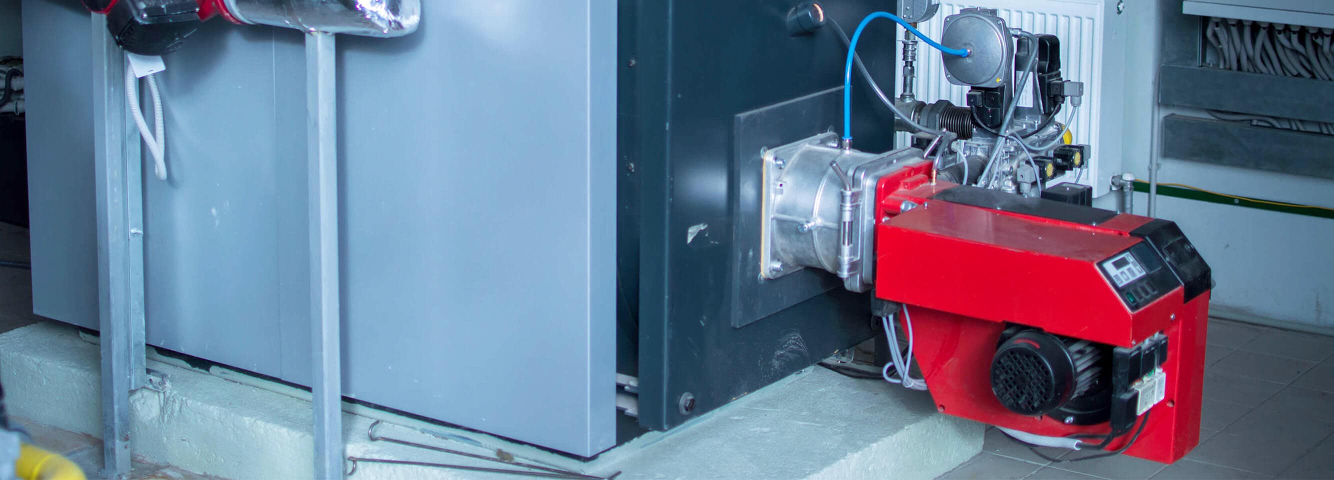 An industrial boiler and a gas burner at a plant