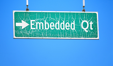 A stylized road sign with the Qt framework designation.