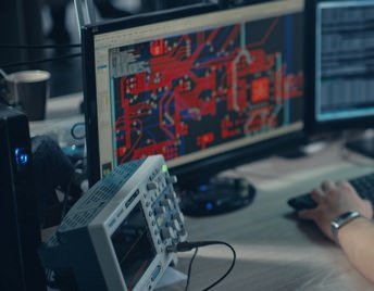 A hardware design engineer uses a computer program to design a high speed PCB.