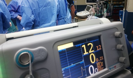 The control panel of a medical electronic system with a screen on it