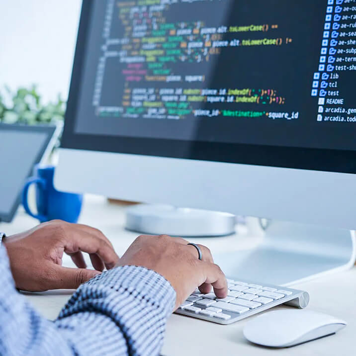 Embedded software engineer working on a PC