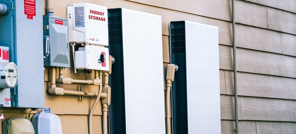 An energy storage system attached to a wall.