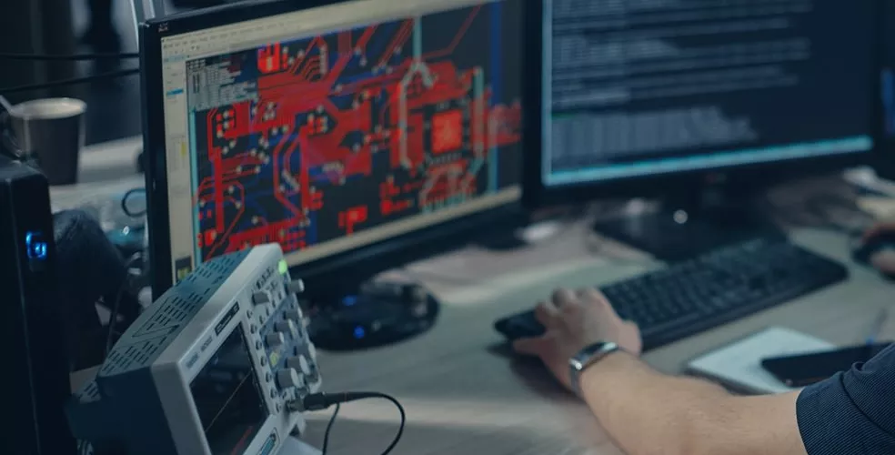 A hardware design engineer uses a computer program to design a high speed PCB.
